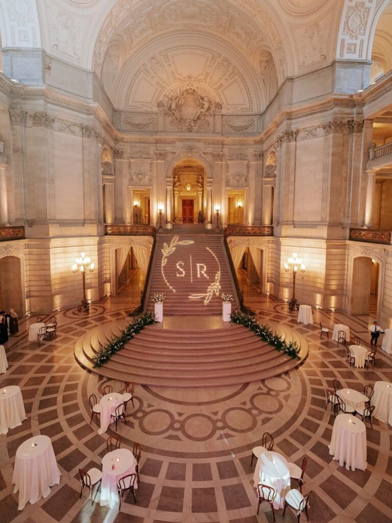 SF City Hall rotunda decorated for an evening wedding reception
