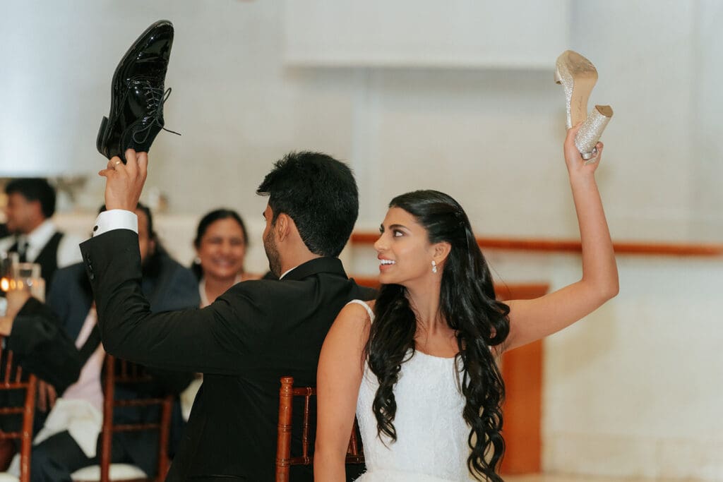 Bride and groom playing the shoe game at San Francisco City Hall