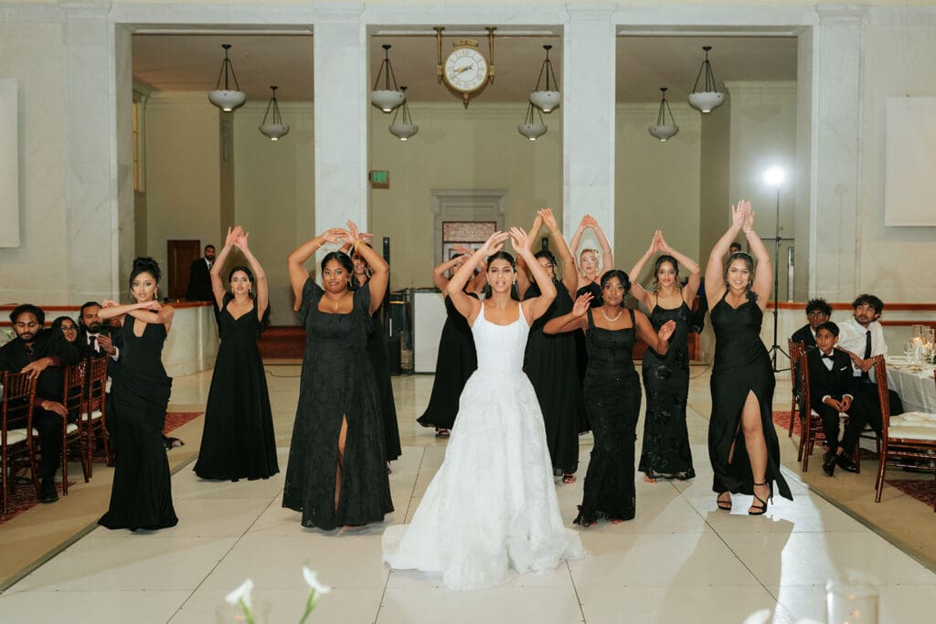 Bridesmaids performing a surprise dance at the wedding reception