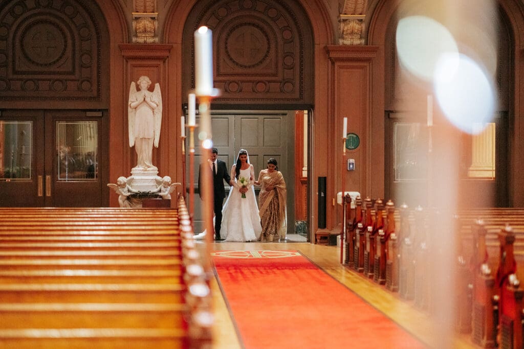 Bride Walking Down the aisle at their St. Ignatius Church Wedding Ceremony